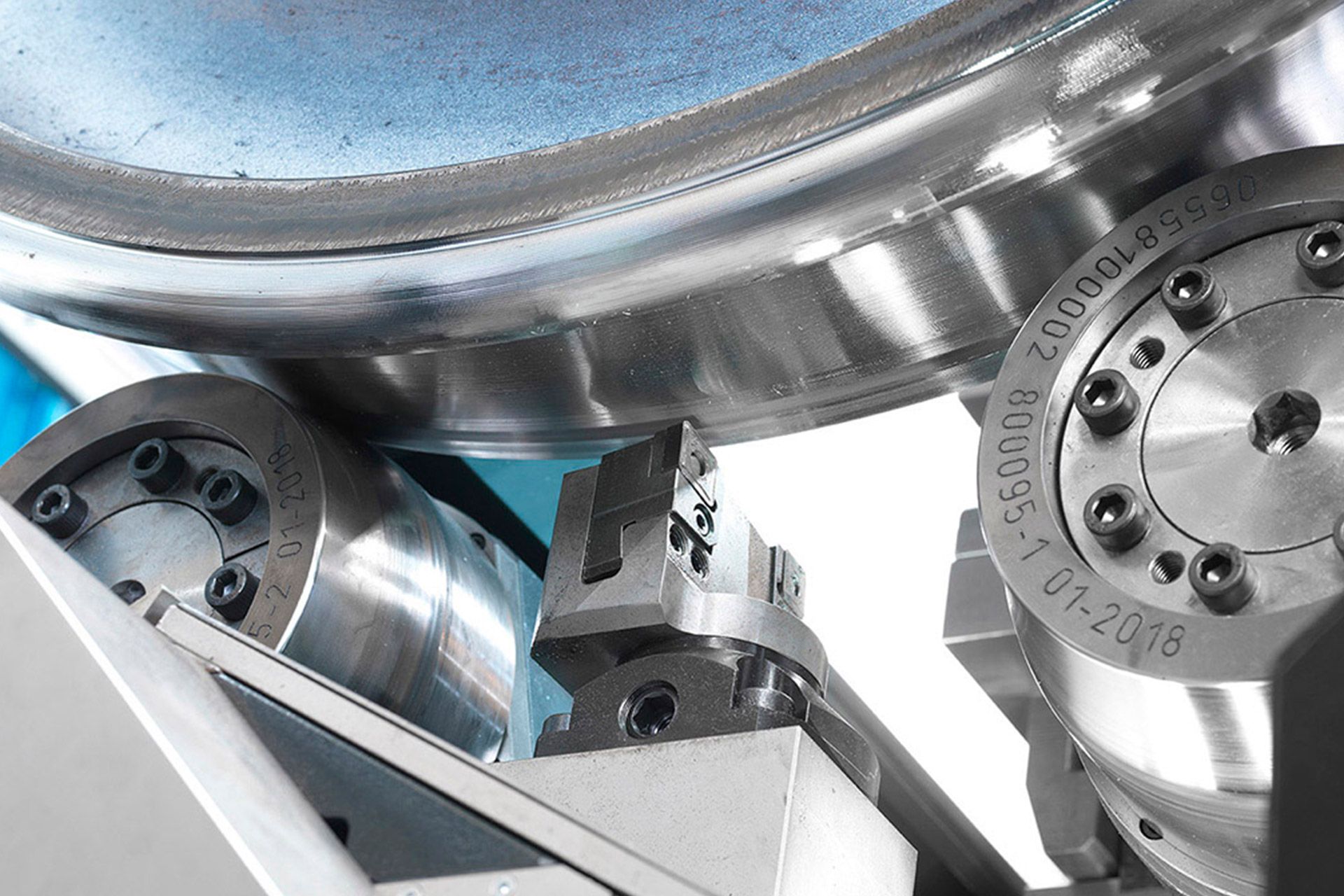 Machines for railway wheelsets, wheels and axles